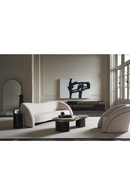 Table basse incurvée en laiton et travertin | Caracole Contrast | Meubleluxe.fr